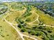 Overhead view of the park with walking trails, water features, and a greenbelt in a vibrant community at 7777 E 23Rd Ave # 1401, Denver, CO 80238