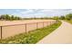 Dog park with a chain-link fence and a sidewalk at 7777 E 23Rd Ave # 1401, Denver, CO 80238
