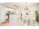 Updated kitchen with stainless steel appliances and dark countertops at 7777 E 23Rd Ave # 1401, Denver, CO 80238
