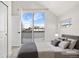 Bedroom with sliding door to private balcony at 3955 W 13Th Ave, Denver, CO 80204