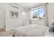 Bright bedroom with large window and plush bedding at 3955 W 13Th Ave, Denver, CO 80204