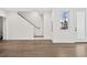 Hardwood floors and staircase leading to the upper level at 3955 W 13Th Ave, Denver, CO 80204