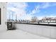 Rooftop deck with city views and snowy ground at 3955 W 13Th Ave, Denver, CO 80204