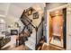 Elegant foyer with hardwood floors, staircase, and a convenient residential elevator at 76 S Garfield St, Denver, CO 80209