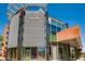 The Hermès store's contemporary exterior features intricate paneling and expansive glass displays at 76 S Garfield St, Denver, CO 80209