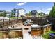 Spacious backyard with a custom fire pit area, perfect for entertaining at 6049 Sandstone Cir, Erie, CO 80516