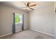 Neutral bedroom featuring carpeted floors and a ceiling fan at 6049 Sandstone Cir, Erie, CO 80516
