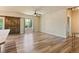 Spacious living room with hardwood floors and a large window at 6049 Sandstone Cir, Erie, CO 80516
