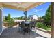 Outdoor patio with a stone floor, perfect for entertaining outdoors at 6049 Sandstone Cir, Erie, CO 80516
