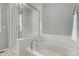 Spa-like bathroom with a soaking tub and a separate shower at 9084 E 37Th Ave, Denver, CO 80238