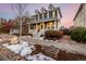 Two-story house with gray siding and front porch at 9084 E 37Th Ave, Denver, CO 80238