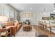 Bright living room showcasing hardwood floors, neutral walls, and stylish furniture at 9275 W Euclid Ave, Littleton, CO 80123