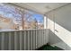 Balcony looking out to an apartment building and bare trees at 10792 E Exposition Ave # 353, Aurora, CO 80012