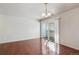 A bright dining room with a sliding door for natural light and patio access at 10792 E Exposition Ave # 353, Aurora, CO 80012