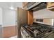 Close up of updated kitchen area with stainless steel oven and stove at 10792 E Exposition Ave # 353, Aurora, CO 80012