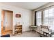 Bright bedroom featuring a corner desk and chair creating a perfect space for work or study at 8204 S Vandriver Way, Aurora, CO 80016