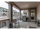 Covered patio with a grill and a view of the community at 8204 S Vandriver Way, Aurora, CO 80016