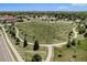 Expansive park featuring walking paths, mature trees, and open green spaces, perfect for community recreation at 8675 W 60Th Ave, Arvada, CO 80004