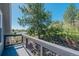 Deck with views of mature trees and surrounding greenery, offering a peaceful outdoor retreat at 1549 Hillside Cir, Sedalia, CO 80135