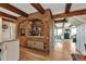 The kitchen features a breakfast bar and a brick coffee nook with granite countertops at 1549 Hillside Cir, Sedalia, CO 80135