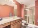 Bathroom with a glass shower, single sink, and a decorative light fixture at 18963 E Long Ave, Centennial, CO 80016