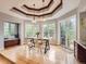 Dining area with coffered ceilings, a large window, and a table with chairs at 18963 E Long Ave, Centennial, CO 80016