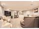 Spacious living room boasts neutral paint, recessed lighting, and plush carpeting for a cozy atmosphere at 18963 E Long Ave, Centennial, CO 80016