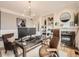 Well-appointed office with a fireplace, built-in shelving, and comfortable seating for a productive workspace at 18963 E Long Ave, Centennial, CO 80016