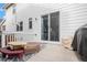 Small patio with slider access, perfect for relaxing at 4715 Crestone Peak St, Brighton, CO 80601