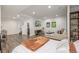 Cozy basement with stylish decor, entertainment setup, and finished flooring at 1754 W 66Th Ave, Denver, CO 80221