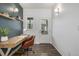 Bright office space with modern desk, shelving, and a door to the outside at 1754 W 66Th Ave, Denver, CO 80221