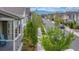 Charming street view with well-maintained sidewalks, lush trees, and manicured lawns enhancing the neighborhood's appeal at 1754 W 66Th Ave, Denver, CO 80221