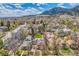 Scenic aerial view of the neighborhood with mountain views, mature trees, and well-maintained homes at 826 Maxwell Ave, Boulder, CO 80304