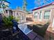 Inviting backyard featuring a patio area, outdoor seating, grill and a charming additional room for entertainment at 826 Maxwell Ave, Boulder, CO 80304