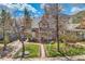 Charming two-story home features a well-manicured lawn and a inviting front porch, adding curb appeal at 826 Maxwell Ave, Boulder, CO 80304