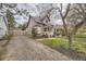 Charming home with stone walkway, lush landscaping and a welcoming porch enhances curb appeal and charm at 826 Maxwell Ave, Boulder, CO 80304