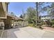 Inviting backyard with covered patio, ceiling fan, and lush landscaping, ideal for relaxation at 1973 S Pitkin St, Aurora, CO 80013