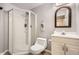 Bathroom featuring modern shower, toilet and vanity at 1973 S Pitkin St, Aurora, CO 80013