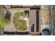 Aerial view of a property featuring solar panels, a fire pit and a boat at 14823 E Colgate Dr, Aurora, CO 80014