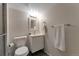 Modern bathroom featuring sleek vanity, contemporary fixtures, and tiled floors at 14823 E Colgate Dr, Aurora, CO 80014