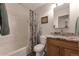 Traditional bathroom with a shower and tub combination and a granite vanity at 14823 E Colgate Dr, Aurora, CO 80014
