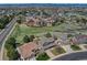 Aerial view showing the property's location within a neighborhood and close proximity to green space at 22021 Pebble Brook Ln, Parker, CO 80138