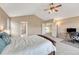 Inviting bedroom with a vaulted ceiling and an open layout at 22021 Pebble Brook Ln, Parker, CO 80138