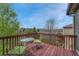 Charming deck with outdoor seating offers serene views of the surrounding neighborhood at 22021 Pebble Brook Ln, Parker, CO 80138