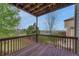 Wooden deck with scenic neighborhood views offers a perfect space for outdoor enjoyment at 22021 Pebble Brook Ln, Parker, CO 80138