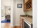 Wet bar area with sink, counter, and under-counter wine fridge at 100 S University Blvd # 11, Denver, CO 80209