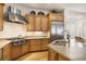 Bright kitchen with stainless steel appliances, custom cabinetry, and sleek countertops at 100 S University Blvd # 11, Denver, CO 80209