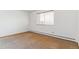 Bedroom featuring tan carpet with a double window and white trim at 635 S Alton Way # 12C, Denver, CO 80247