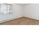 Bright bedroom offers neutral carpet and a window with natural light at 635 S Alton Way # 12C, Denver, CO 80247