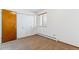 Cozy bedroom featuring neutral carpet, closet and window with blinds at 635 S Alton Way # 12C, Denver, CO 80247